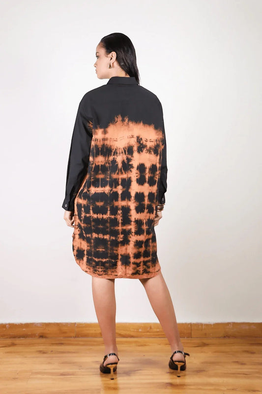 Seen Unseen tangerine orange tie-dye long shirt dress with oversized fit and black accents.