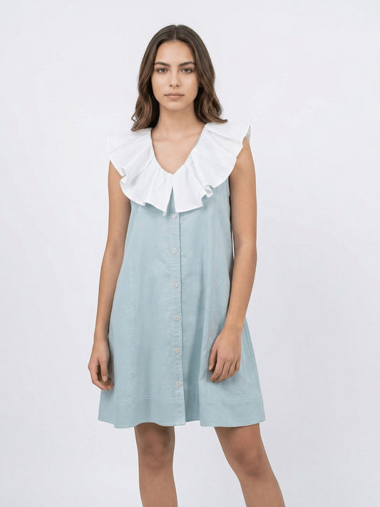 Seen Unseen Celeste Ruffle Collar Dress in light blue cotton with a white layered collar and button-down front.