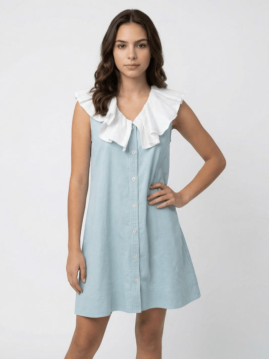 Seen Unseen Celeste Ruffle Collar Dress in light blue cotton with a white ruffled collar and button-down front.
